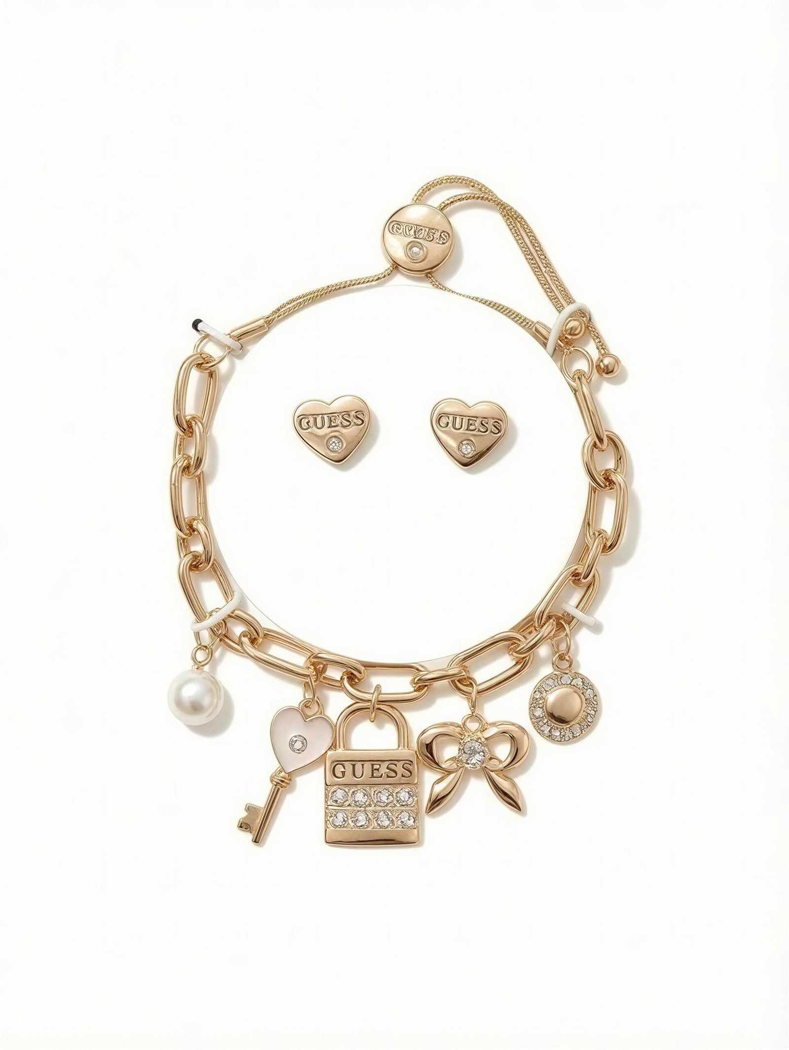 GUESS Juego de Pulsera de Dijes y Aretes de Corazón con Cristales GUESS Juego de Pulsera de Dijes y Aretes de Corazón con Cristales